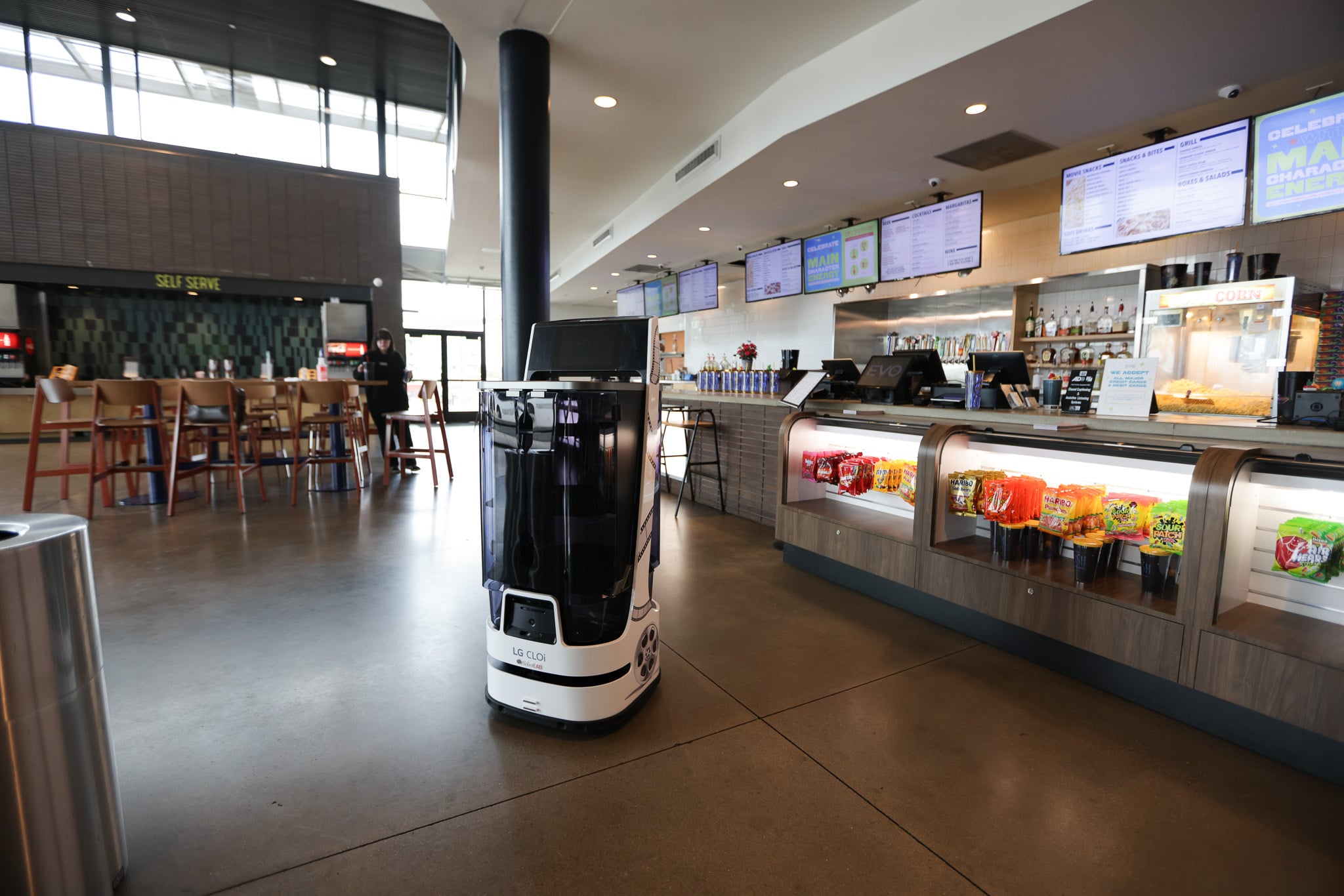 Which service restaurant automation solutions include the implementation of robot waiters for food delivery?
